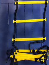 Load image into Gallery viewer, This agility ladder is a great tool for you to improve quickness, leg strength, and balance through accelerated foot strike and lift frequency. It will help lose weight as it can TORCH CALORIES bigtime. Ladder is 12 feet long. 8 durable plastic rungs. Each rung is 20 inches long
